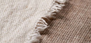 Farklı dokularda ve renklerde çarşaf. Doğal kumaşlar organik keten ve pamuktan, el yapımı tekstil. Eko, kırsal, boho, hygge dekor kapatma arkaplanı için çuval bezi ve tuval