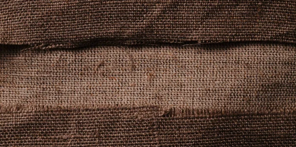 在不同的纹理和颜色的衬里 天然面料由有机亚麻和棉花制成 国产纺织品手工制作 地毯和帆布 用于生态 乡村音乐 Boho Hygge装饰特写背景 — 图库照片