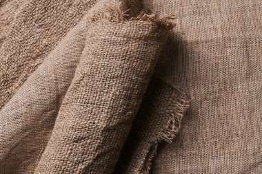 Farklı dokularda ve renklerde çarşaf. Doğal kumaşlar organik keten ve pamuktan, el yapımı tekstil. Eko, kırsal, boho, hygge dekor kapatma arkaplanı için çuval bezi ve tuval