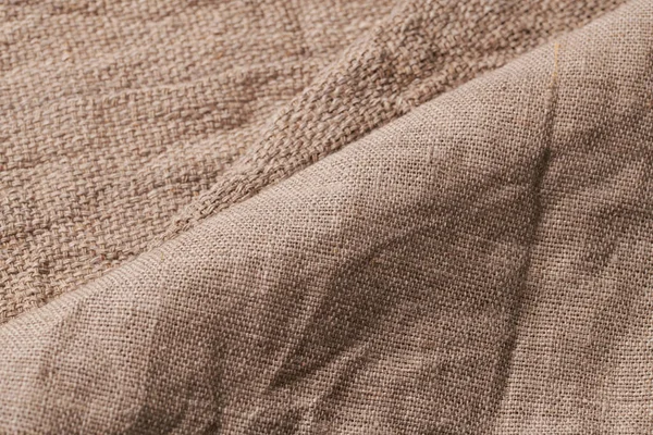 異なるテクスチャと色でリネン オーガニックの亜麻と綿 手作りのホームスン繊維から天然生地 素朴な Boho 巨大な装飾のためのブラップとキャンバスクローズアップ背景 — ストック写真