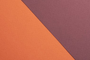 Rough kraft paper background, paper texture red burgundy orange colors. Mockup with copy space for tex