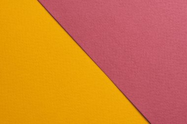 Rough kraft paper background, paper texture red burgundy yellow colors. Mockup with copy space for tex