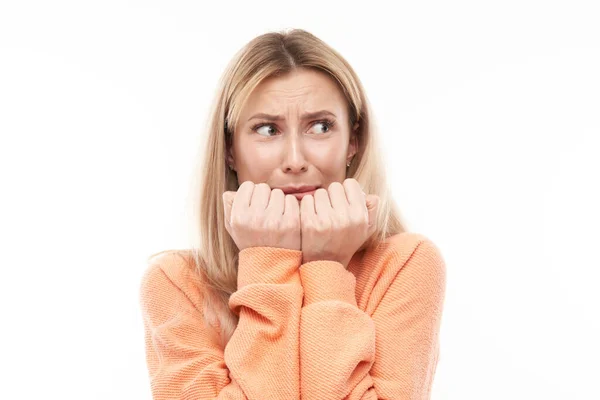 Portrait Scared Young Woman Nervously Biting Nails Isolated White Background — Stock Photo, Image