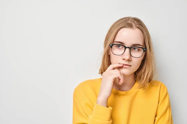 Clever Blond Student Girl Glasses Touch Chin Thinks Chooses Isolated — Stock Photo, Image