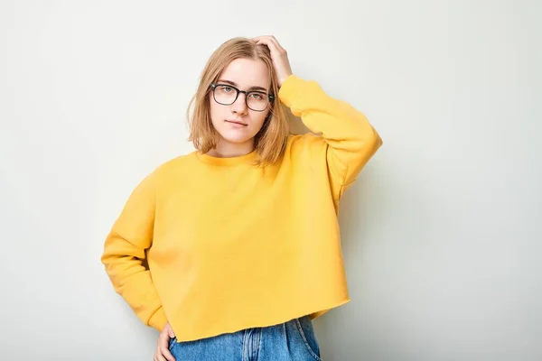 Clever Blond Student Girl Glasses Touches Head Thinks Chooses Isolated — Stock Photo, Image