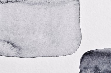 Soyut arkaplan. Suluboya mürekkep çok renkli sanat kolajı. Beyaz pape üzerinde siyah gri lekeler, lekeler ve fırça darbeleri akrilik boya