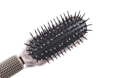 Beyaz arka plan üzerinde izole plastik masaj tarağı