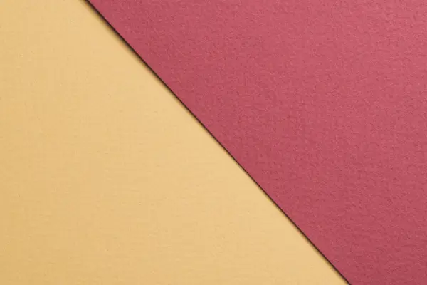 Rough kraft paper background, paper texture red burgundy beige colors. Mockup with copy space for tex