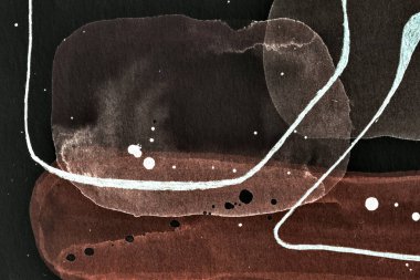 Siyah ve kahverengi soyut arka plan. Renkli mürekkep lekeleri, lekeler, duvar kağıdı baskısı. Yaratıcı arkaplan, kaotik boya fırça darbeleri, kart üzerine baskı kalıpları