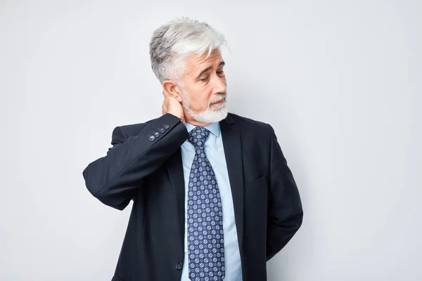 Portrait Mature Gray Haired Man Suffering Pain Touching Neck Isolated — Stock Photo, Image