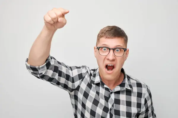 Portrait Angry Young Man Yelling Pointing Menacingly Camera Isolated White — Stock Photo, Image