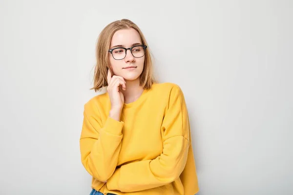 Clever Blond Student Girl Glasses Touch Chin Thinks Chooses Isolated — Stock Photo, Image