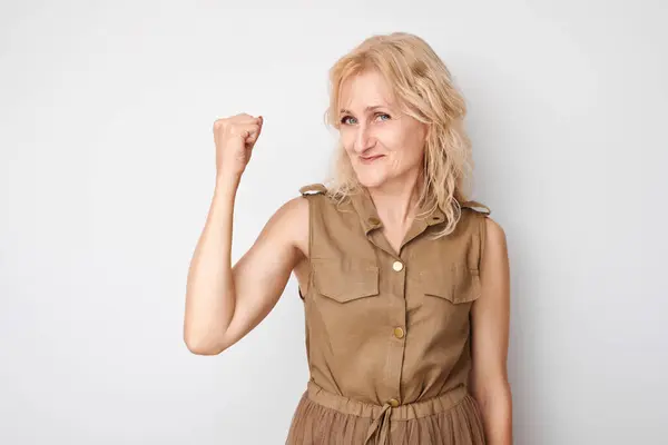 Portrait Confident Year Old Woman Showing Biceps Demonstrating Strength Isolated — Stock Photo, Image