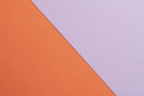 Rough kraft paper background, paper texture lilac orange colors. Mockup with copy space for tex