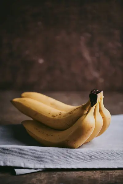 Close Bunch Bananas Dark Fabric Background — Stock Photo, Image