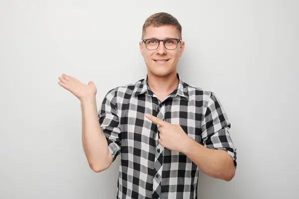 Handsome Man Glasses Holding Something Hand Demonstrating Empty Space Product — Stock Photo, Image