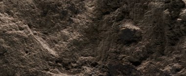 Kahverengi taş dokusu, koyu soyut arkaplan. Doğal mineral kaya detayları kapat, tasarım için kopya alanı olan boş arkaplan