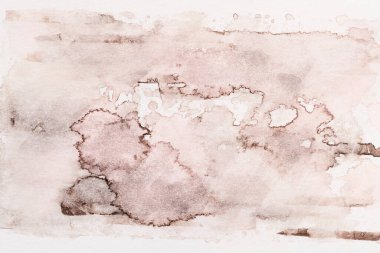 Soyut sıvı sanat arka planı. Kahverengi suluboya beyaz kağıt üzerinde şeffaf lekeler