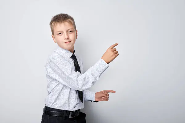 Portrait Boy School Uniform Pointing Finger Empty Space Product Advertising — Stock Photo, Image