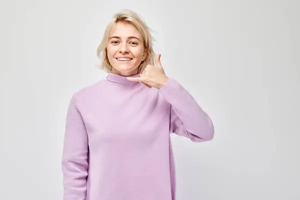 Smiling Woman Purple Turtleneck Making Call Gesture Isolated Light Background — Stock Photo, Image