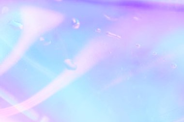 Mavi ve morun şeffaf tonlarında bulanık odak ile soyut arkaplan