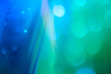 Yeşil mavi tonlarda bulanık odaklı soyut arkaplan