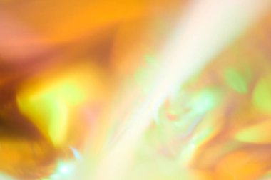 Sarı-turuncu tonlarda bulanık odaklı soyut arkaplan