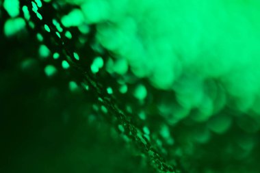 Yeşil gölgelerde bulanık odaklı soyut arkaplan