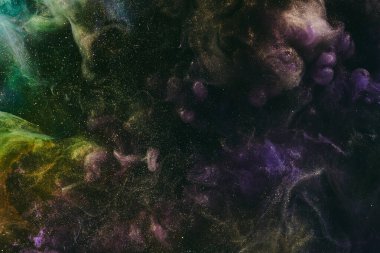 Soyut renkli arkaplan. Değişken renkli boya akışı, sıvı sıvı sanat