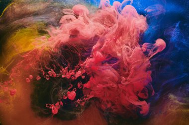 Soyut renkli arkaplan. Değişken renkli boya akışı, sıvı sıvı sanat