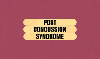 PCS Post Concussion Syndrome Symbol. Concept word PCS Post Concussion Syndrome on beautiful wooden stick. Beautiful Pink Chart Paper Background. Business and PCS Post Concussion Syndrome concept. Copy space clipart