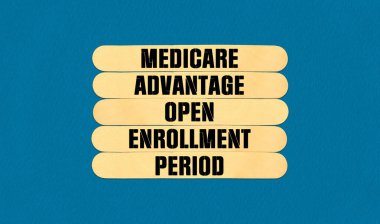 MAOEP Symbol. Concept word MAOEP Medicare Advantage Open Enrollment Period on beautiful wooden stick. Beautiful Blue Chart Paper Background. Business and MAOEP Medicare Advantage Open Enrollment Period concept. Copy space clipart