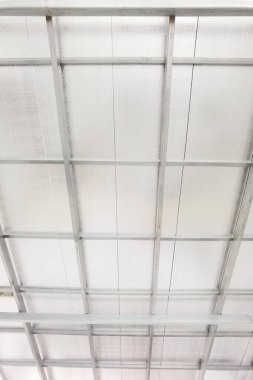  roof covered with corrugated aluminum sheets on metal supports 