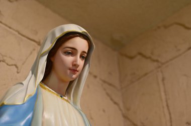 Closeup of Beautiful Statue of Our lady of grace virgin Mary in the church, Thailand. selective focus. clipart