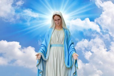 Our lady of grace virgin Mary with Bright Blue Sky and beautiful clouds with abstract colored background and wallpaper. clipart