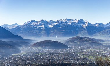 View from the Victor Mountain in Austria over the Rhine valley and the surrounding mountains clipart