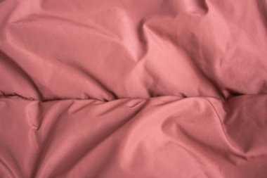 Doku dokusu. Tekstil kahverengi örgü kumaş arka plan. Kış havası için ceket ya da ceket..