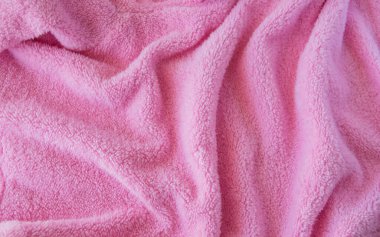 Pembe örülü kumaş. Tekstil kumaş arkaplanı.