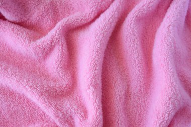 Pembe dokuma kumaşı. Tekstil kumaş arkaplanı.