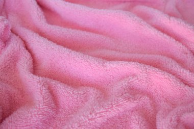 Pembe kumaşın dokusu. Tekstil kumaş arkaplanı.