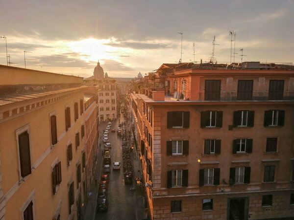 Rooftop view of the streets of Rome at sunset