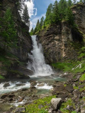 Hell's waterfall (Cascata dell'Inferno), at the Alpe Devero, near Baceno in the Lepontine Alps of Northern Italy, Piedmont Region. clipart