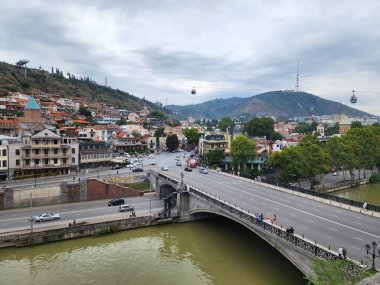 Metekhi Bridge spanning the Kura River in Tbilisi, Georgia clipart