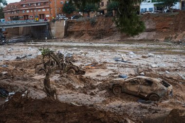 cars buried by the mud in the Poyo ravine, in Paiporta affected by DANA in Valencia, on November 12, 2024 clipart