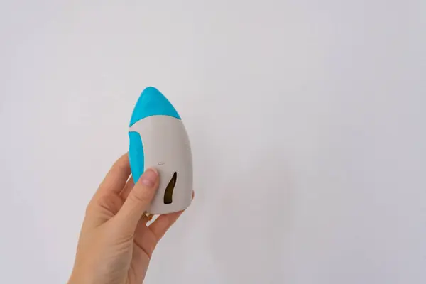 Modern burun spreyini arka planda tutarak. Yüksek kalite fotoğraf