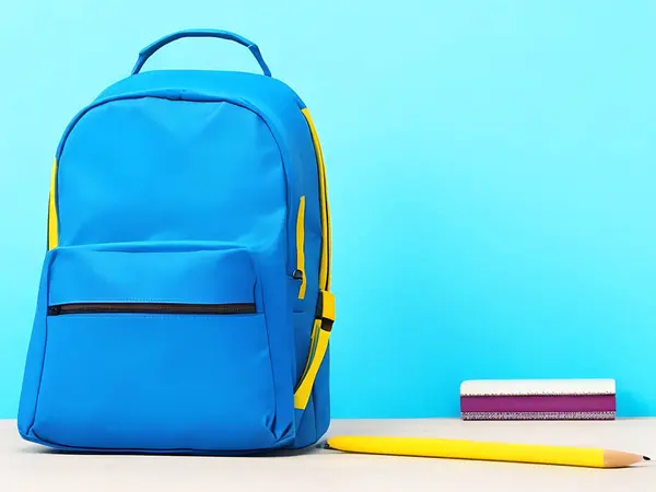 stock image Blue school backpack on background 
