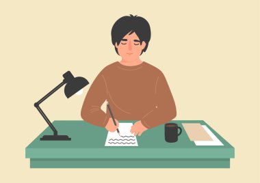 Adam masadaki kağıda yazıyor..