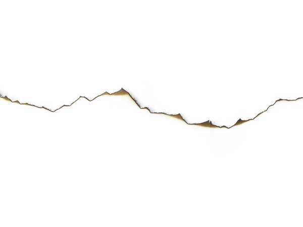 Огненные дыры в белой бумаге. Коллекция сгоревших отверстий в листе бумаги на белом фоне