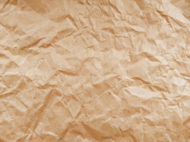Buruşmuş kağıt dokusu. Arkaplan için kahverengi buruşmuş kağıt dokusu