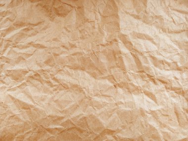 Buruşmuş kağıt dokusu. Arkaplan için kahverengi buruşmuş kağıt dokusu